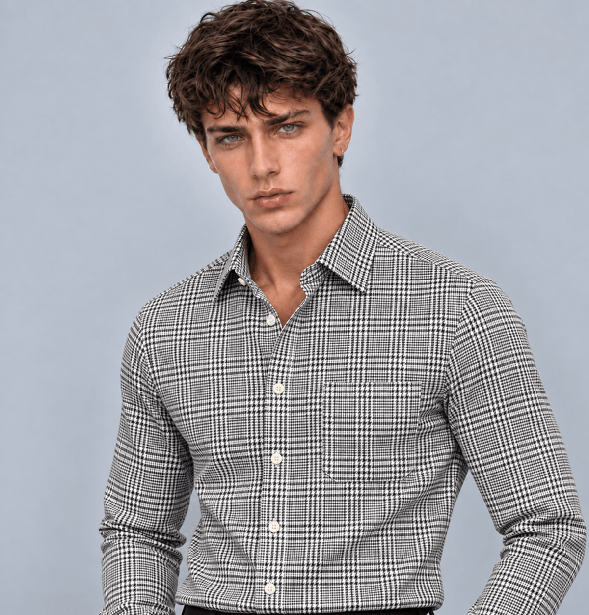 Close-up of a man wearing a black Prince of Wales check dress shirt with a classic collar and tailored fit.